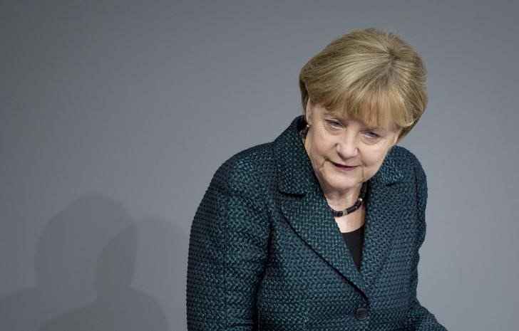 © Reuters. German Chancellor Angela Merkel holds a speech during a debate at the lower house of parliament Bundestag in Berlin