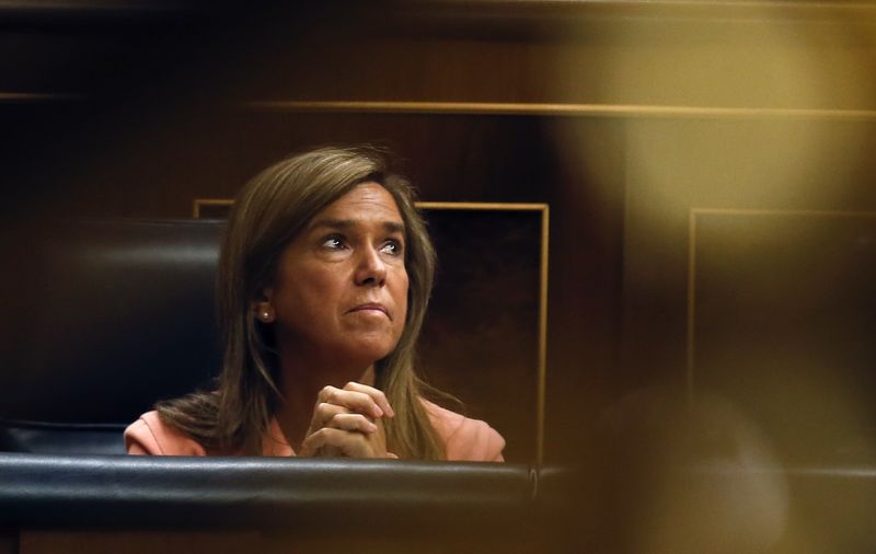 © Reuters. Spanish Health Minister Ana Mato reacts at Spanish parliament in Madrid