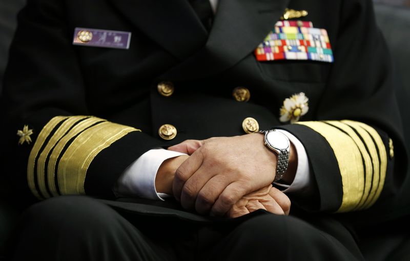 © Reuters. Admiral Katsutoshi Kawano, chief of the Japanese Self-Defense Forces' Joint Staff, speaks during an interview at the Japanese defense ministry in Tokyo