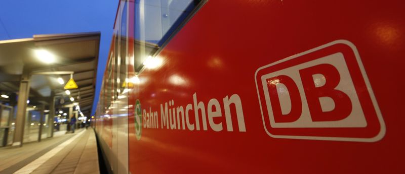 © Reuters. Deutsche Bahn sign is pictured at train at train station in Munich