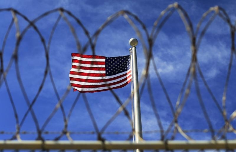 © Reuters. The U.S. flag flies over Camp VI, a prison used to house detainees at the U.S. Naval Base at Guantanamo Bay