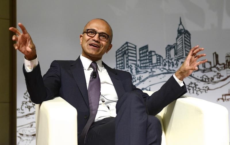 © Reuters. Microsoft Chief Executive Satya Nadella gestures as he speaks during a forum at Tsinghua University in Beijing