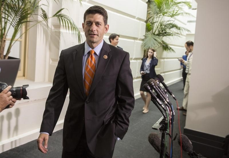 © Reuters. Budget Committee Chairman Paul Ryan (R-WI) walks from a Republican caucus meeting at the Capitol in Washington