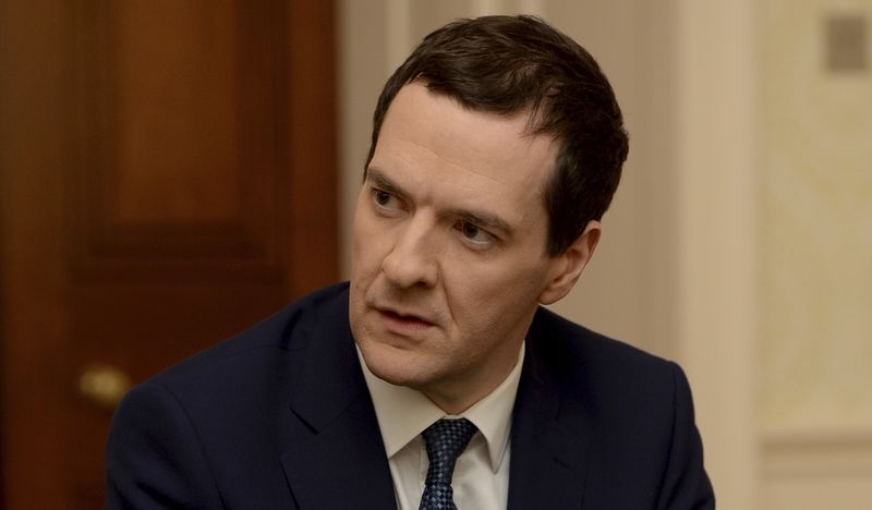 © Reuters. Britain's Chancellor of the Exchequer George Osborne speaks to members of the Armed Forces at 11 Downing Street, in central London