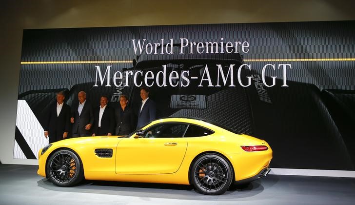 © Reuters. Daimler officials and Mercedes Formula One driver Rosberg pose at the world premiere of the new Mercedes AMG GT super sports car at the Mercedes AMG headquarters in Affalterbach