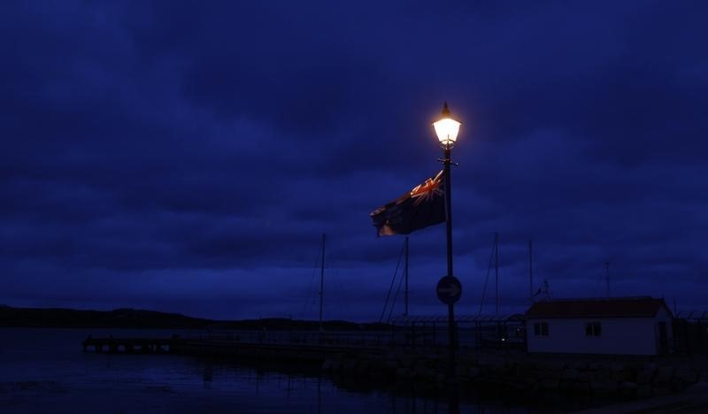 © Reuters. A Falkland Islands flag is seen on the coast of Stanley