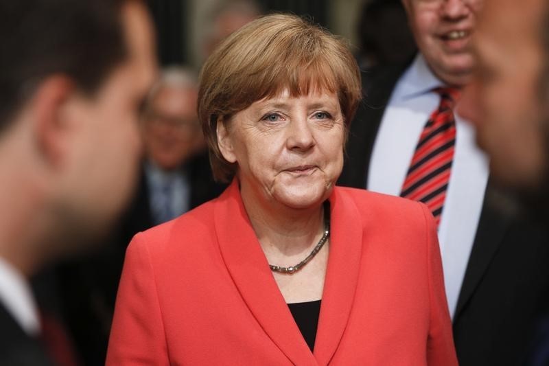 © Reuters. German Chancellor and head of the Christian Democratic Union (CDU) Merkel attends a ceremony to mark the 70th anniversary of the foundation of the CDU in Berlin