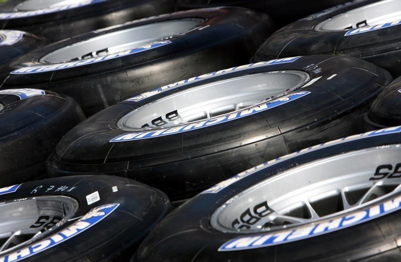 © Reuters. Michelin Formula One racing tyres sit stacked in the pit area at Albert Park race track in Melbourne
