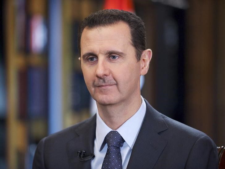 © Reuters. Syria's President Bashar al-Assad speaks during an interview with Venezuelan state television TeleSUR in Damascus