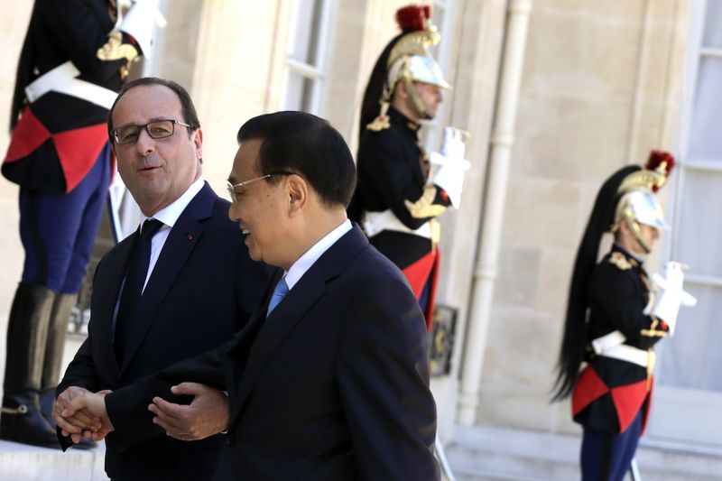 © Reuters. LE PREMIER MINISTRE CHINOIS DÉVOILE LA CONTRIBUTION DE PÉKIN POUR LE CLIMAT