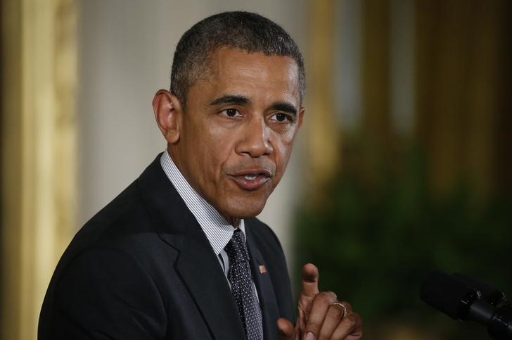 © Reuters. U.S. President Barack Obama speaks after signing the Defending Public Safety Employees' Retirement Act and Trade Preference Extension Act of 2015 during ceremony at White House in Washington