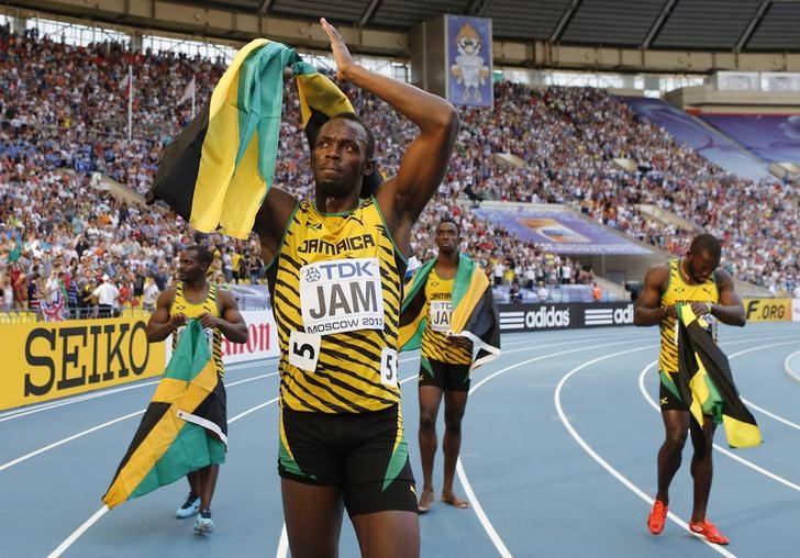 © Reuters. Bolt, lesionado, se retira de las pruebas de la Diamond League en París y Lausana