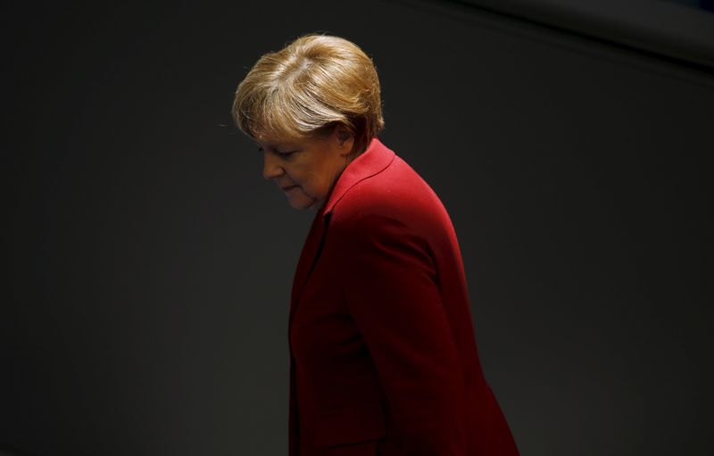 © Reuters. File photo of German Chancellor Merkel attending a debate at Bundestag in Berlin