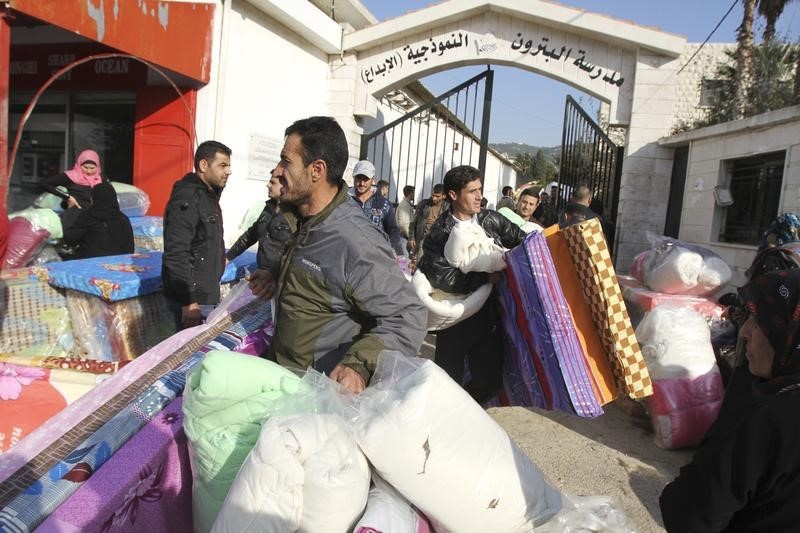 © Reuters. الامم المتحدة تخفض حصص اللاجئين السوريين مجددا بسبب نقص الاموال