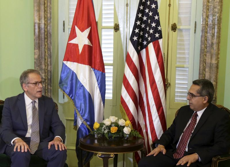 © Reuters. DeLaurentis talks to Medina in Havana