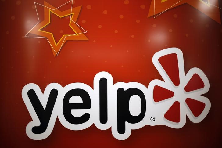 © Reuters. The Yelp Inc. logo is seen in their offices in Chicago