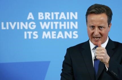 © Reuters. Britain's Prime Minister David Cameron gestures as he delivers a speech on the economy, in Nottingham