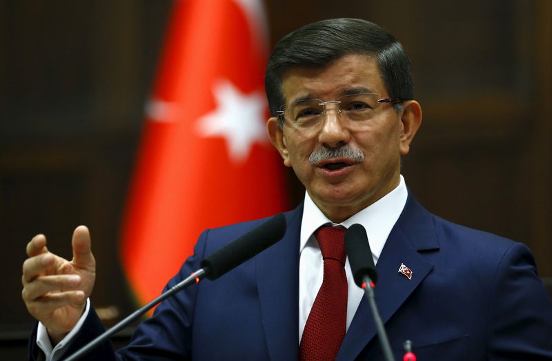 © Reuters. Turkey's Prime Minister Davutoglu addresses members of parliament from his ruling AK Party at the Turkish parliament in Ankara