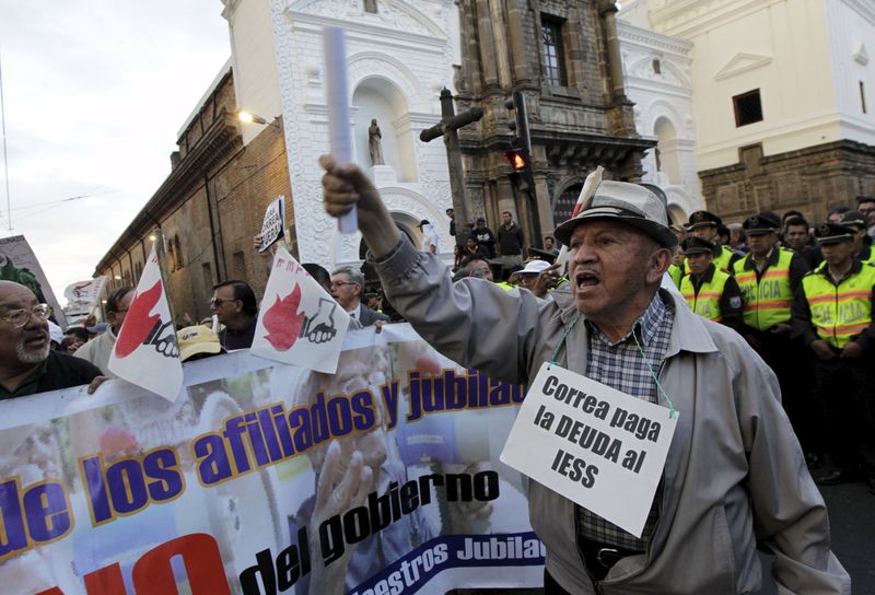 © Reuters. A protester yells slogans during a march against the government of Ecuador's President Rafael Correa in Quito
