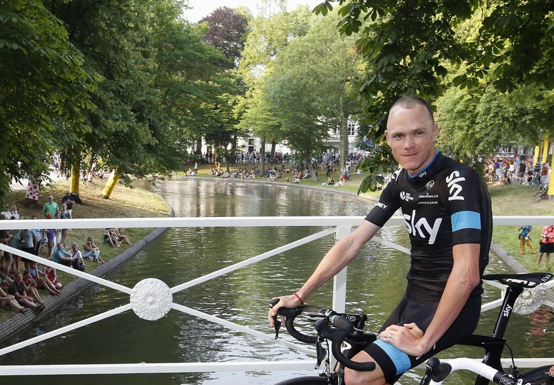 © Reuters. Team Sky rider Froome of Britain looks on during the opening ceremony of the Tour de France cycling race in Utrecht