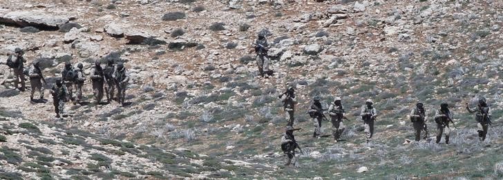 © Reuters. تلفزيون:بدء هجوم واسع للجيش السوري وحزب الله على الزبداني