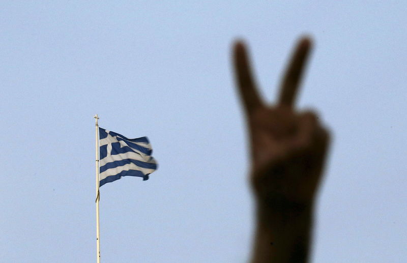 © Reuters. No supporter flashes victory sign in Athens