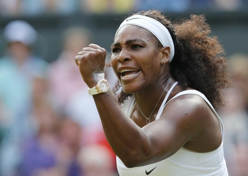 © Reuters. Serena Williams of the U.S.A. celebrates winning a game during her match against Heather Watson of Britain at the Wimbledon Tennis Championships in London