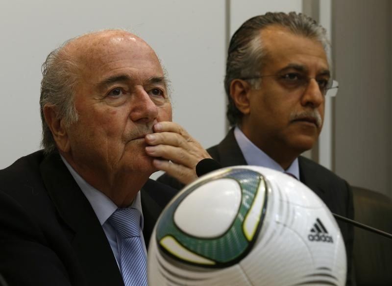 © Reuters. FIFA President Blatter and AFC President Shaikh Salman attend a news conference after an event celebrating the 100th anniversary of Hong Kong's Football Association in Hong Kong