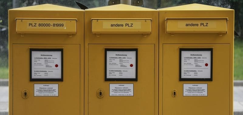 © Reuters. Letterboxes of German mail carrier Deutsche Post are seen during a demonstration in Munich