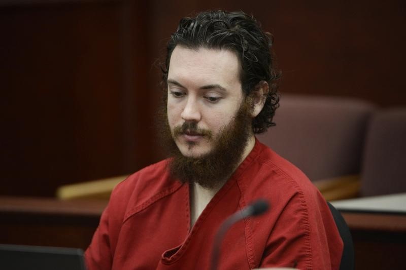 © Reuters. James Holmes sits in court for an advisement hearing at the Arapahoe County Justice Center in Centennial