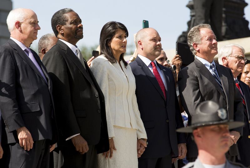 © Reuters. South Carolina Republican Governor Haley watches as the Confederate battle flag is permanently removed from the South Carolina statehouse grounds during a ceremony in Columbia