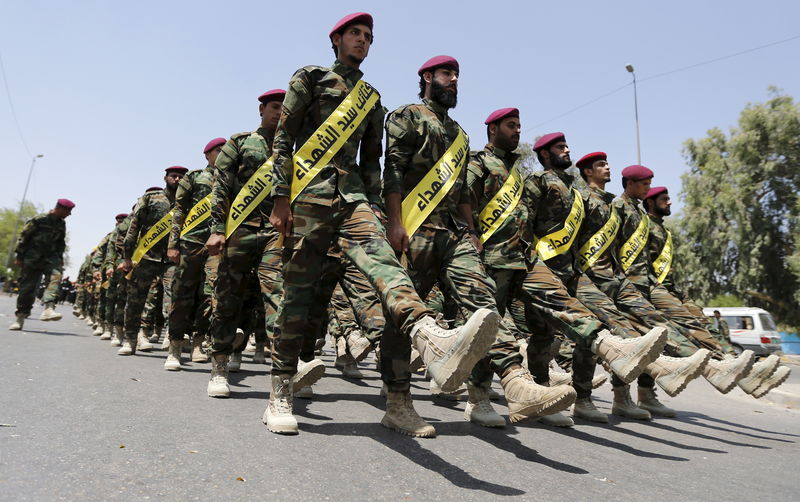 © Reuters. تحليل-المقاتلون الشيعة بالعراق يستهدفون الفلوجة في حملة استعادة الأنبار