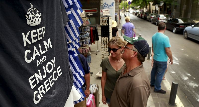 © Reuters. T-shirts on display in a shop in Athens, Greece 