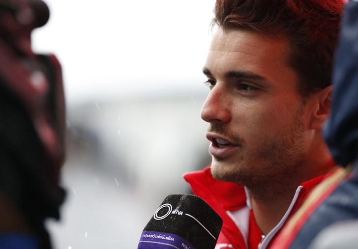 © Reuters. Marussia Formula One driver Bianchi of France speaks to the media after a news conference at the Suzuka circuit