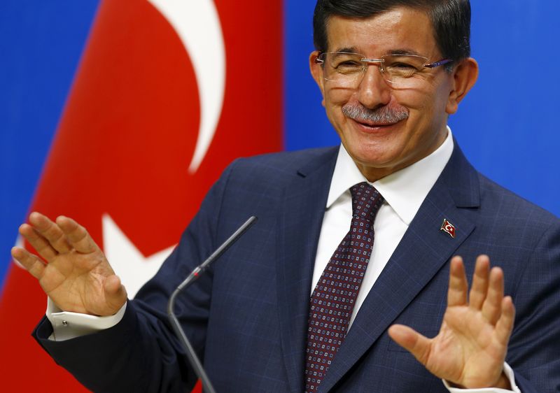 © Reuters. Turkey's Prime Minister Davutoglu gestures during a news conference at his ruling AK Party headquarters in Ankara