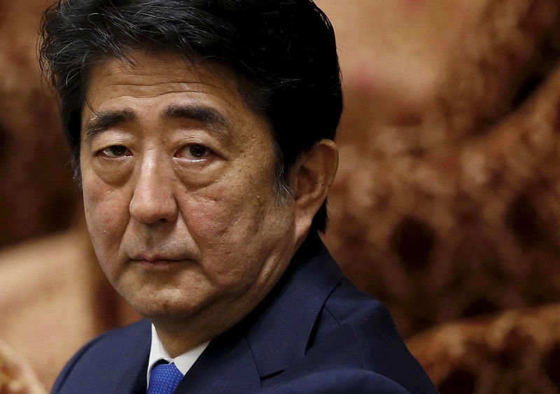 © Reuters. Japan's Prime Minister Abe attends a lower house special committee session on security-related legislation at the parliament in Tokyo