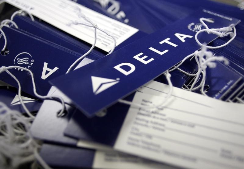 © Reuters. Delta airline name tags are seen at Delta terminal in JFK Airport in New York