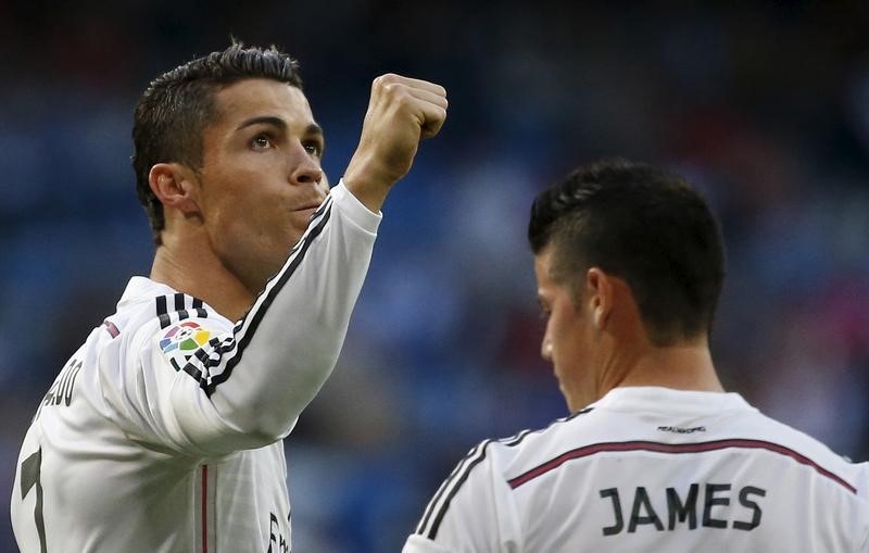 © Reuters. Real Madrid's Cristiano Ronaldo celebrates his goal during their Spanish first division soccer match against Getafe at Santiago Bernabeu stadium in Madrid