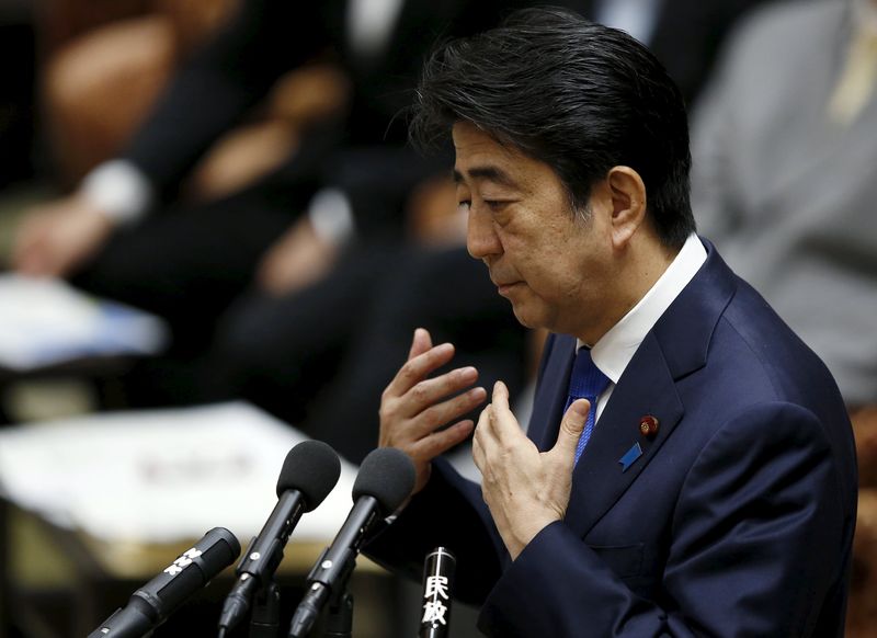 © Reuters. Japan's PM Abe speaks at a lower house special committee session on security-related legislation at the parliament in Tokyo