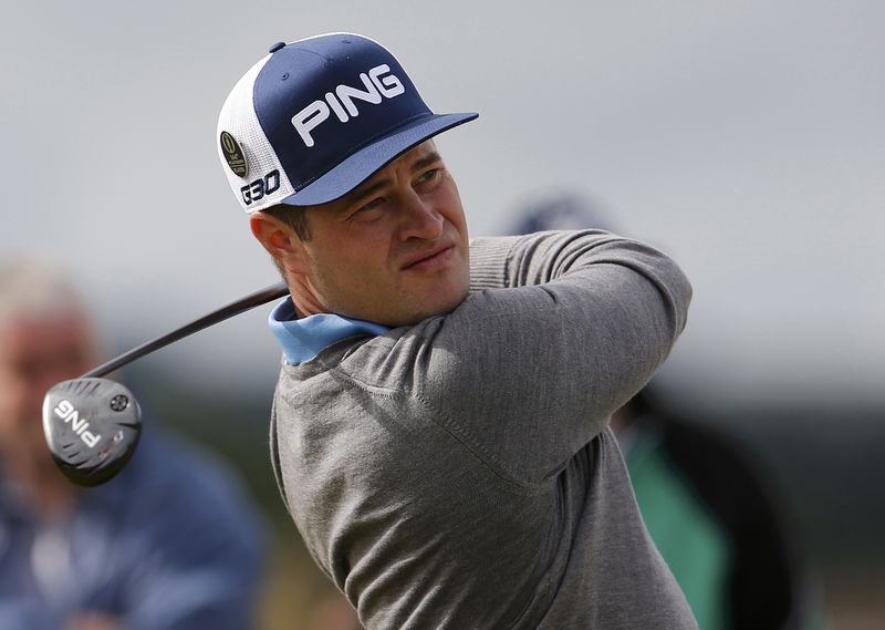 © Reuters. Lingmerth of Sweden watches his tee shot on the tenth hole during the first round of the British Open golf championship on the Old Course in St. Andrews, Scotland