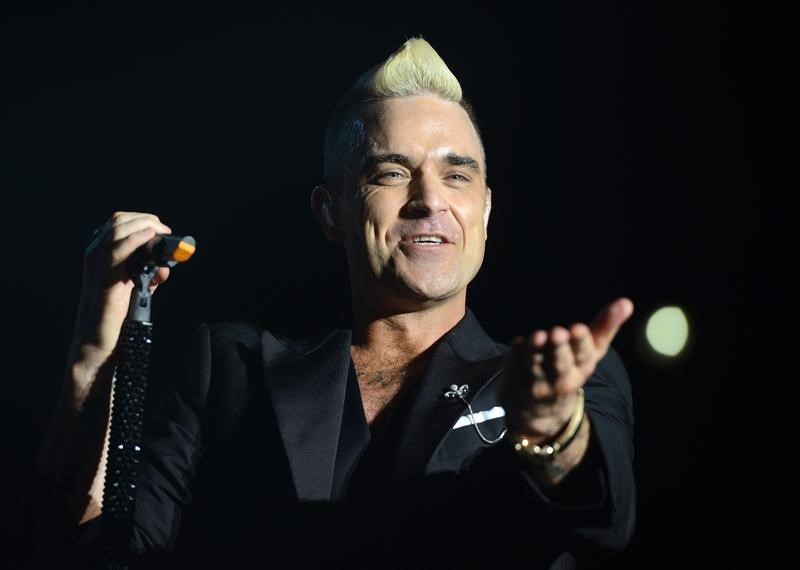 © Reuters. Robbie Williams durante apresentação em Mônaco