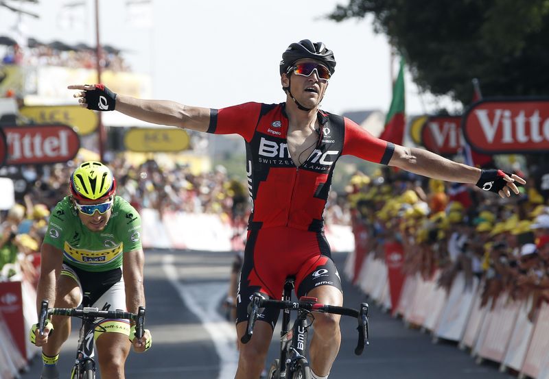 © Reuters. BMC Racing rider Van Avermaet of Belgium celebrates as he crosses the finish line to win the 13th stage of the Tour de France cycling race