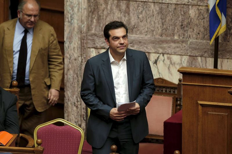 © Reuters. Greek PM Tsipras arrives for a parliamentary session in Athens