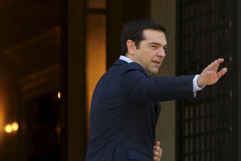 © Reuters. Grecia inicia el pago de 6.250 millones de euros al BCE y al FMI  