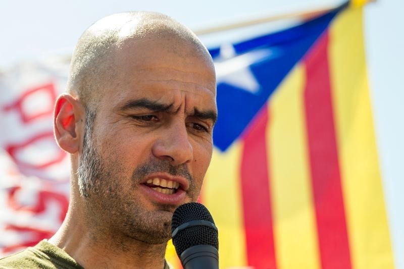 © Reuters. Pep Guardiola cerrará la lista unitaria en las elecciones catalanas