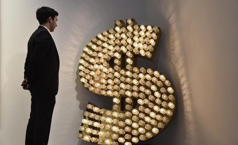 © Reuters. Art works inspired by the US dollar which will be auctioned go on display at Sotheby's in London