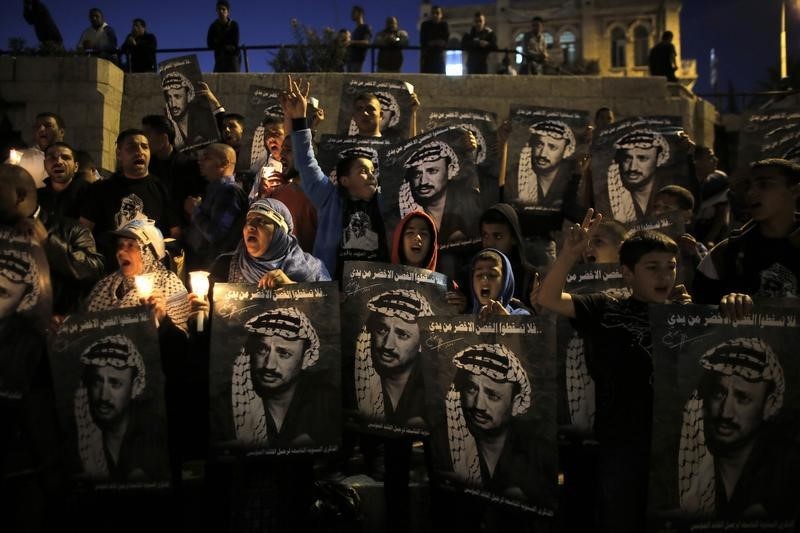 © Reuters. NON-LIEU REQUIS DANS L'ENQUÊTE SUR LA MORT D'ARAFAT