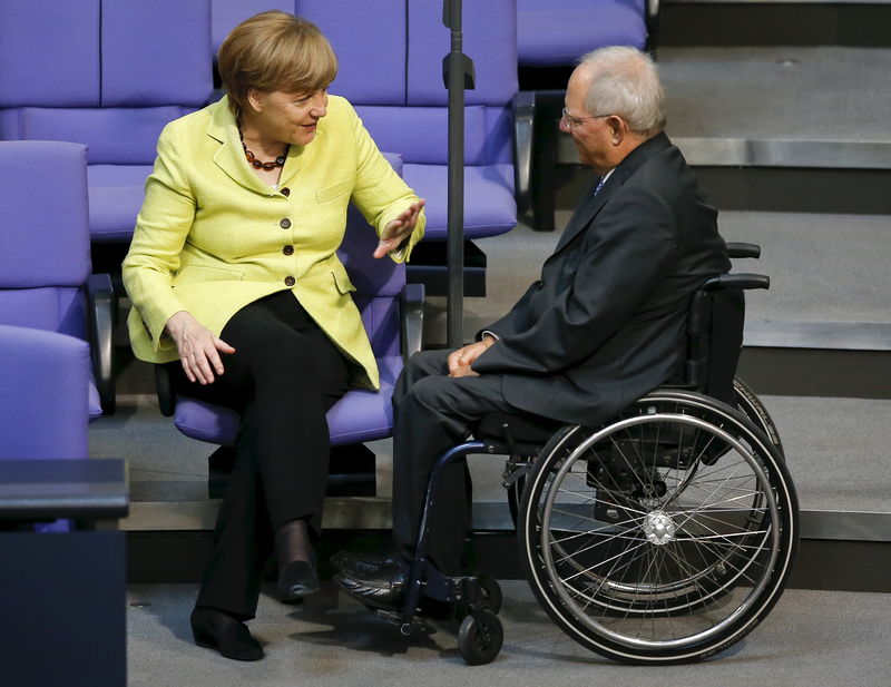 © Reuters. File photo shows German Chancellor Angela Merkel talking to Finance Minister Wolfgang Schaeuble during a debate of the Bundestag, the lower house of parliament, in Berlin