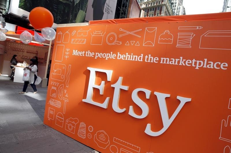 © Reuters. A sign advertising the online seller Etsy Inc. is seen outside the Nasdaq market site in Times Square following Etsy's IPO in New York