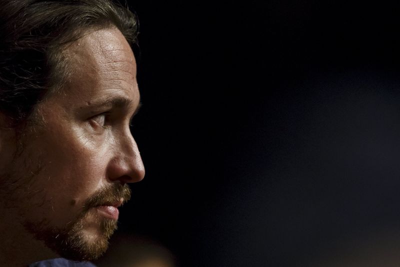 © Reuters. Pablo Iglesias, leader of Spain's anti-austerity party Podemos (We Can) attends a meeting in Madrid 